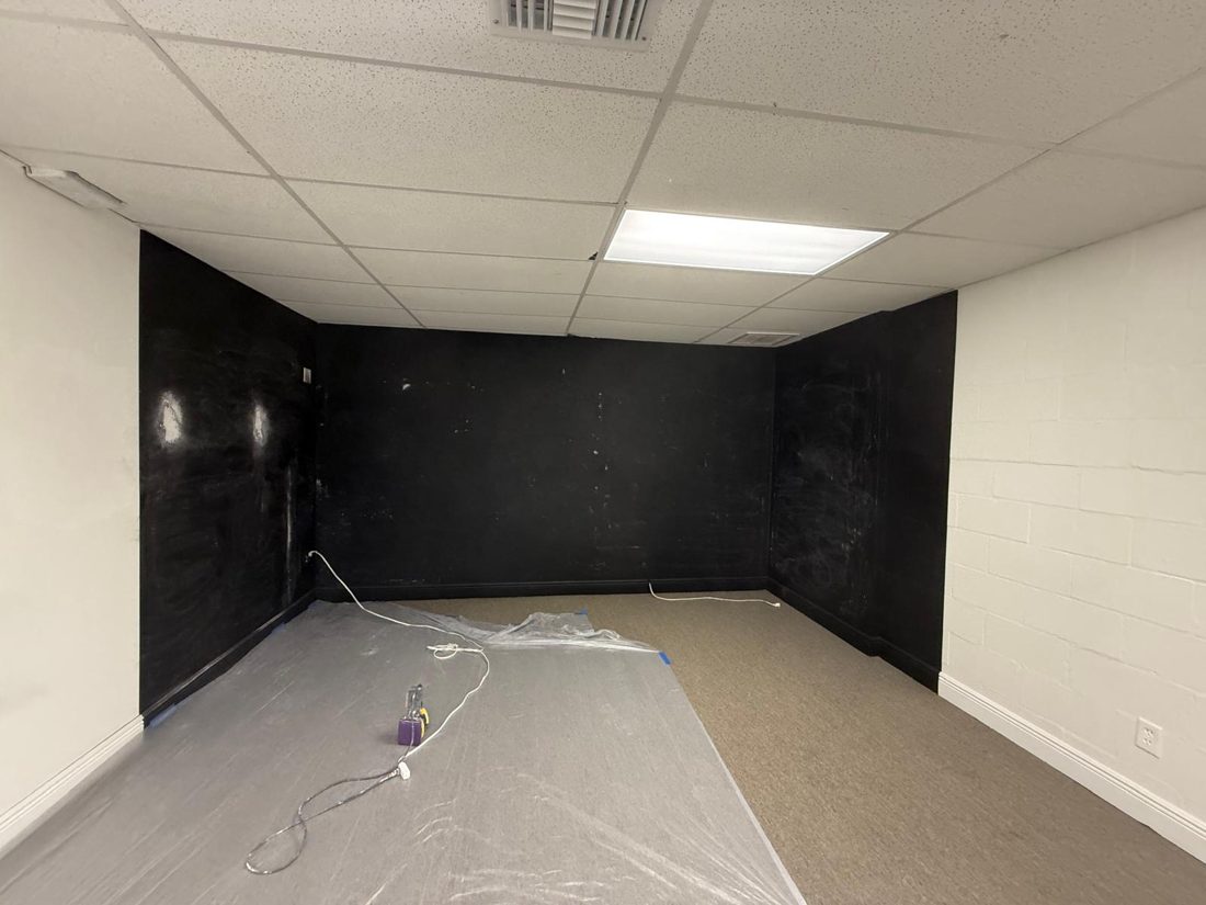 Commercial suite repaint, the surface before the work started